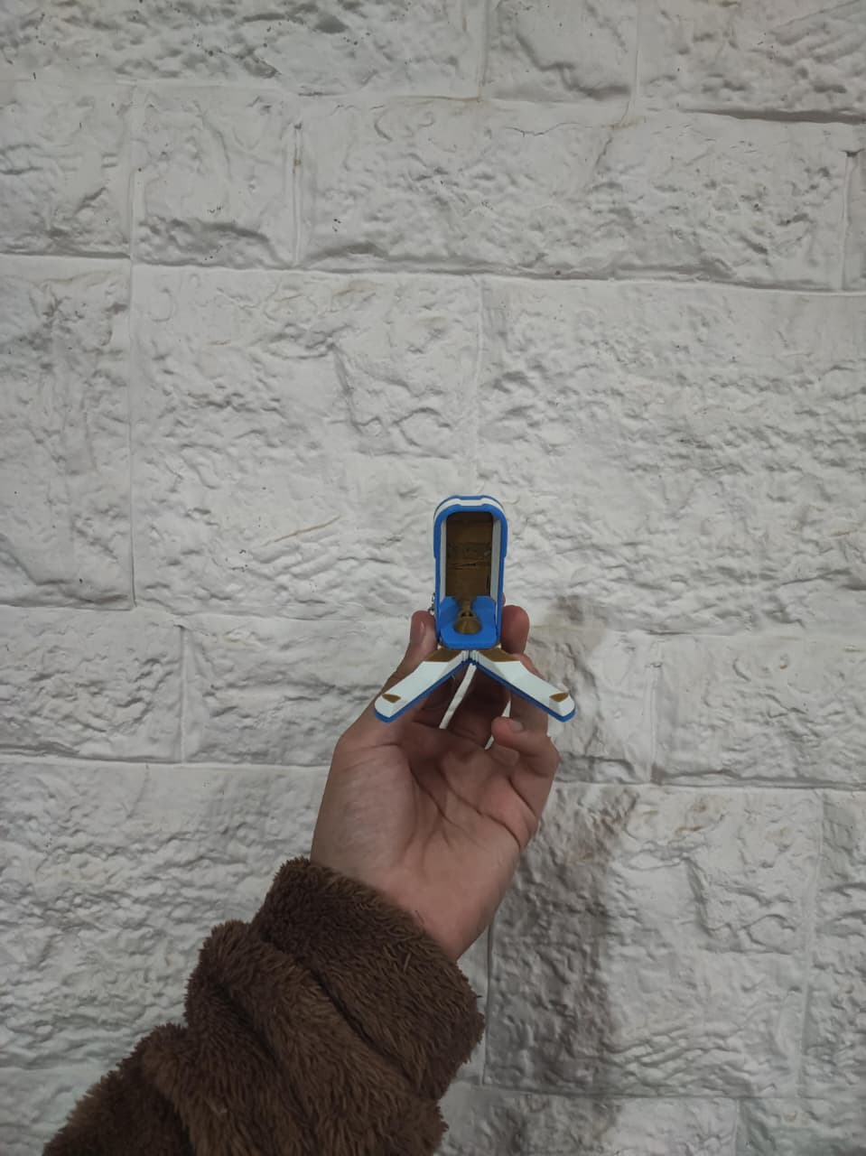Llavero apoya celular